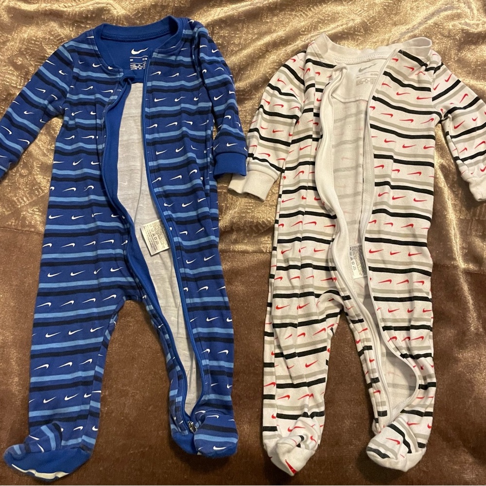 Two Nike Onesies